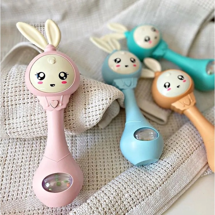 Baby rattle teether with light and sound