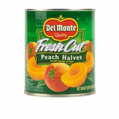 BUAH PEACH HALVES DELMONTE 825GR YELLOW PEACHES IN SYRUP DEL MONTE