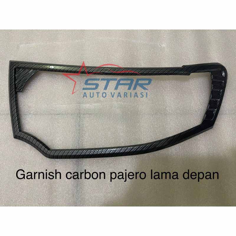 Garnish lampu depan carbon Pajero lama.