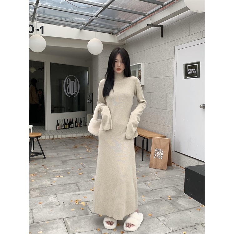 Red Ketat retro hitam berleher tinggi rajutan gaun wanita Prancis musim gugur dan musim dingin rok pinggang tas panjang pinggul rok baru