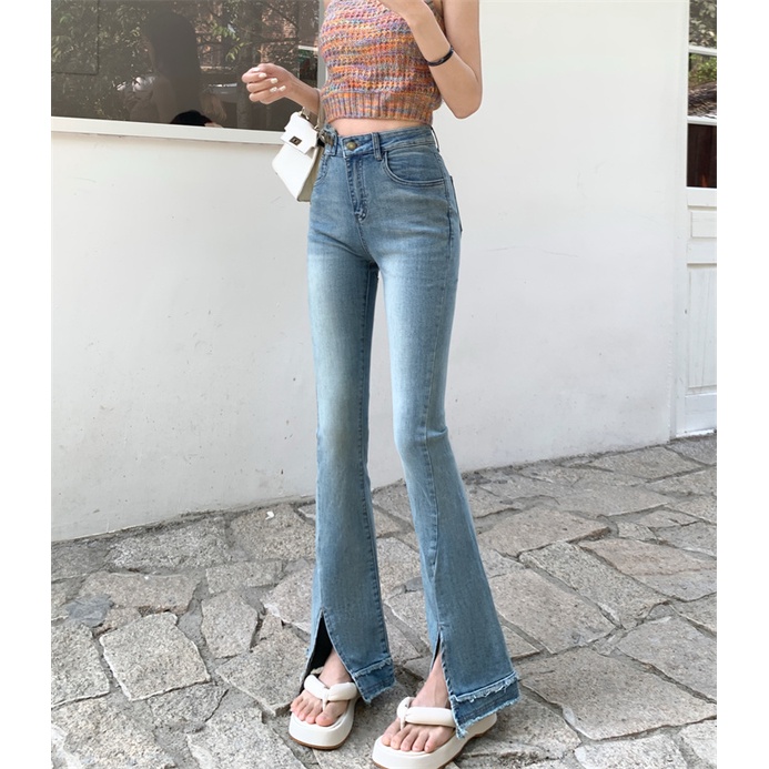 Red Kepribadian celah mentah tepi celana jeans wanita musim semi pinggang tinggi celana hot girl slim blue micro flared celana mengepel celana