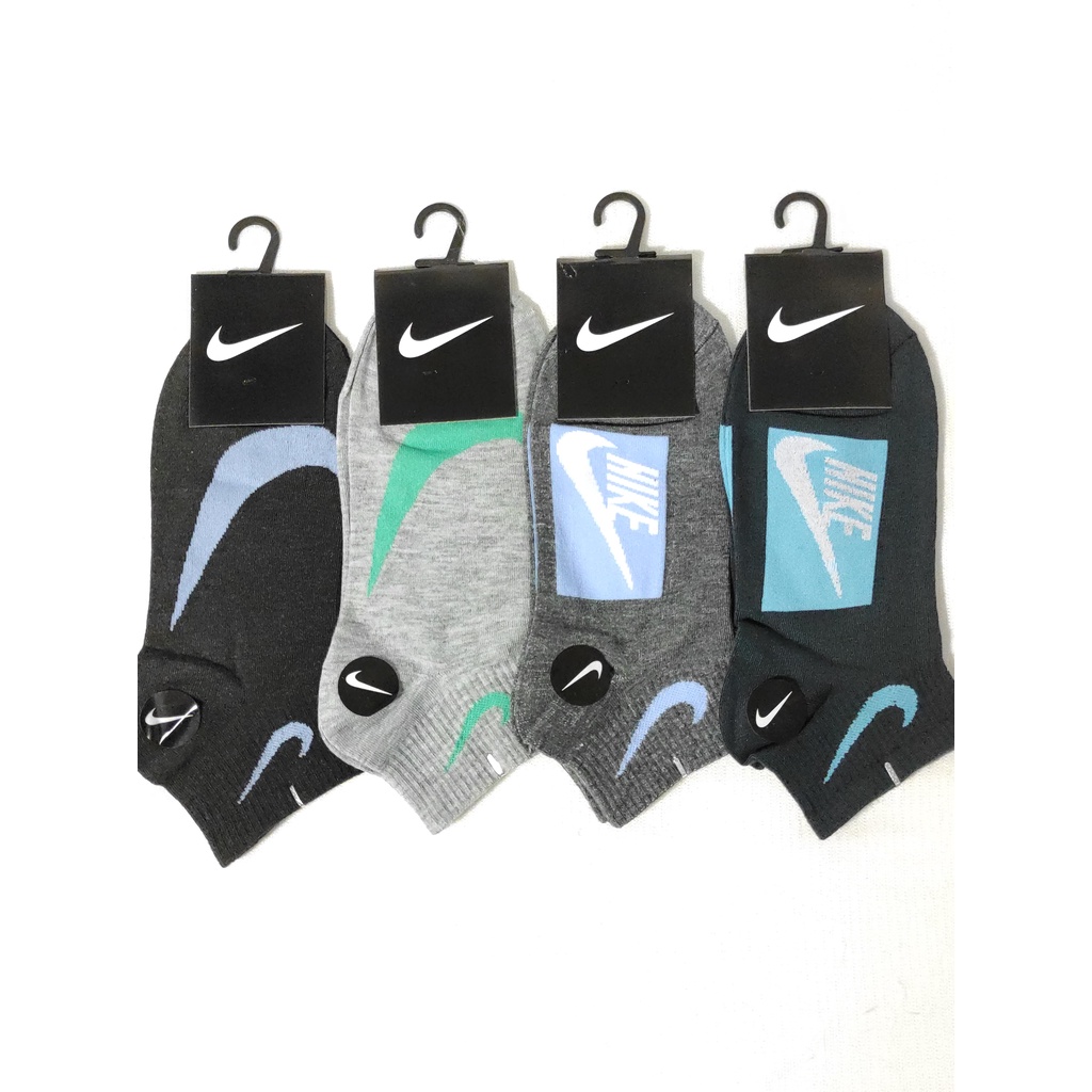 Kaos kaki sport matakaki motif Nike