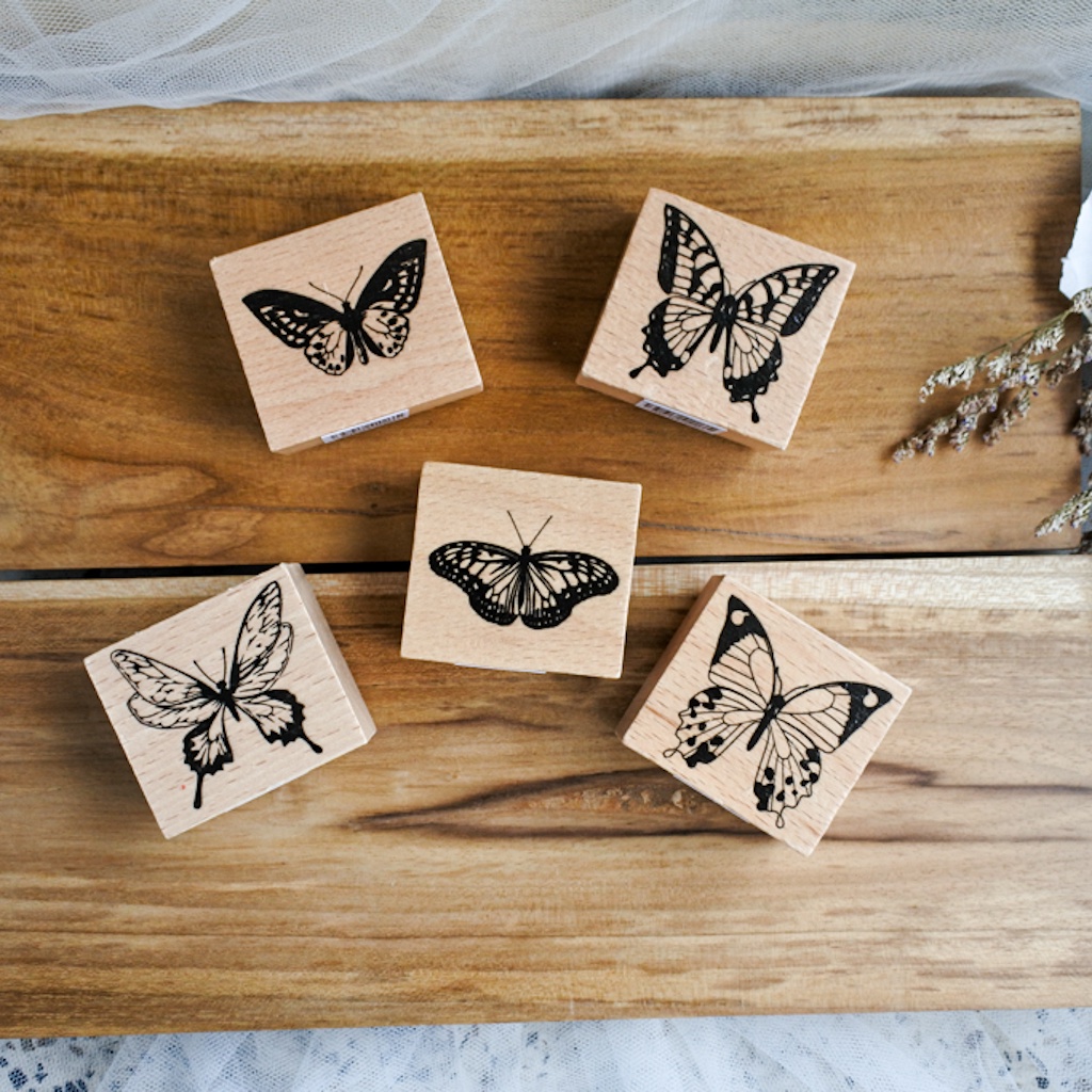 

stampel kupu kupu kayu vintage