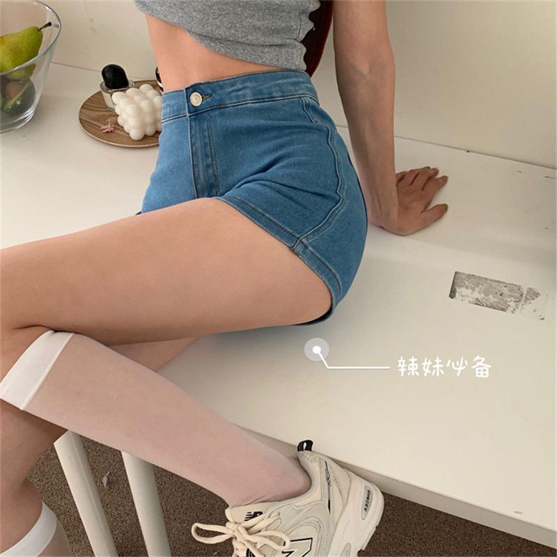 Red American hot girl hip-lifting slim-fit denim shorts wanita pakaian luar musim panas pelangsing dan pengurangan usia elastis hot pants ins tide