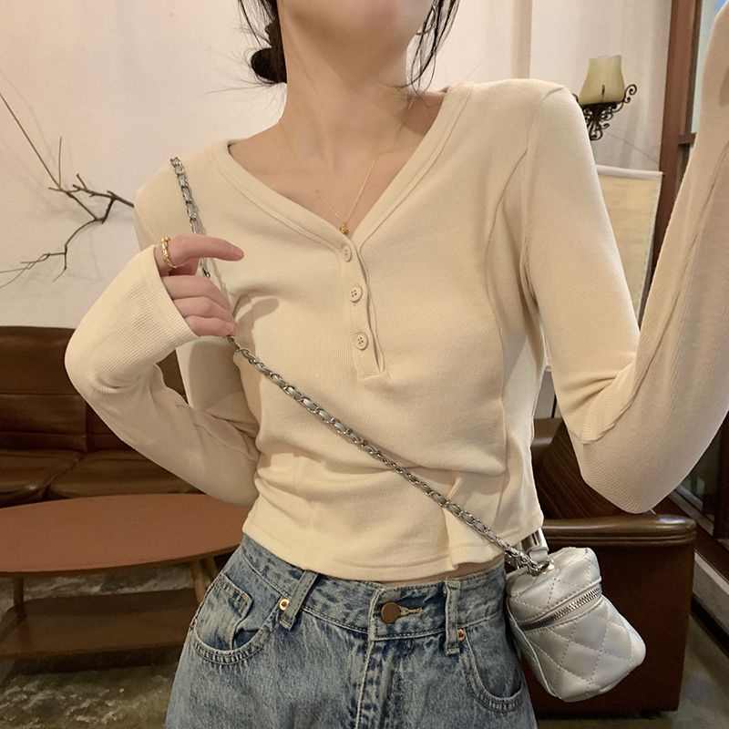 Red Hot girl short bottoming T-shirt wanita musim semi versi Korea dari baru slim slim V-neck button chic inner long-sleeve top