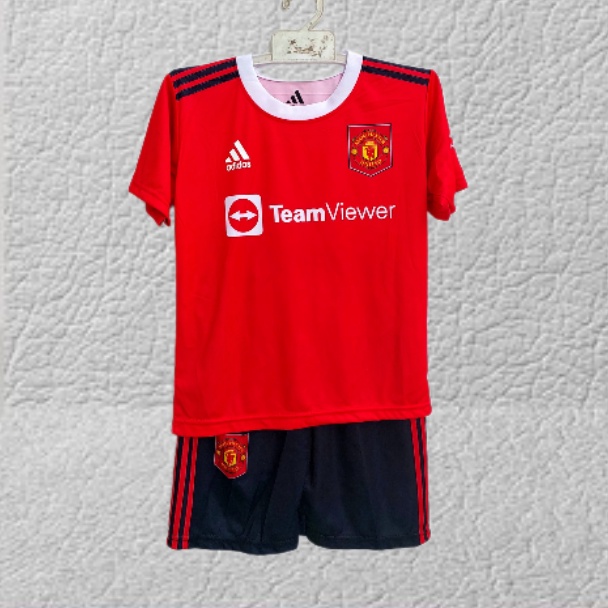 setelan jersey baju bo;a MU full printing size 10-20 usia 5-12thn