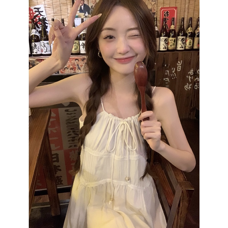 Red Temperamen Kumikumi all-match suspender dress wanita rasa desain musim semi dasi A-line rok mid-length rok