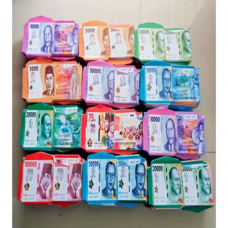 

100 Lembar AMPLOP LEBARAN MOTIF UANG SIZE MEDIUM ( FREE PLASTIK )