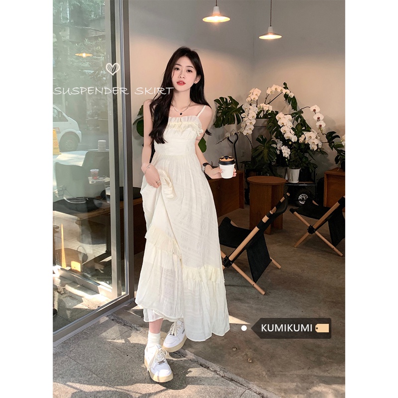 Red kumikumi design sense small wooden ear side suspender dress female early spring waist slimming a-line skirt long skirt