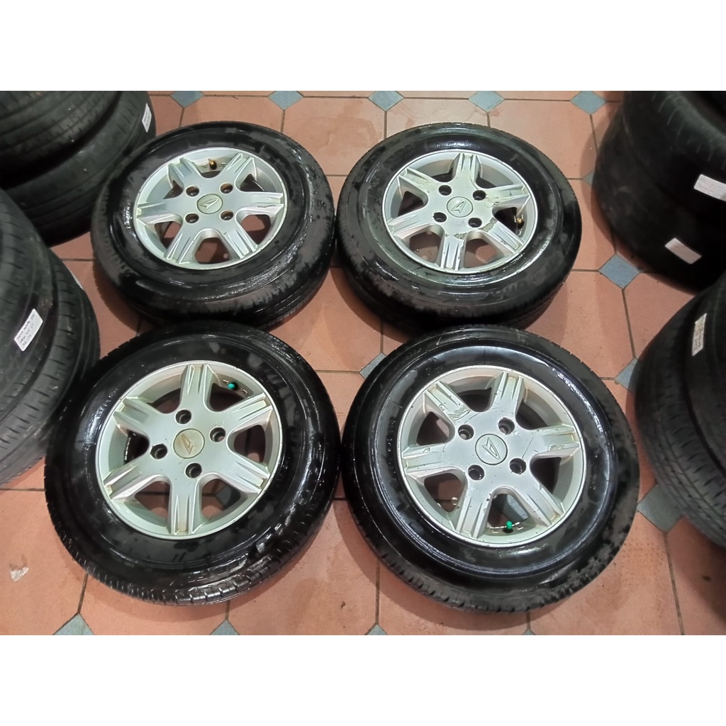 velg original xenia ring 13 plus ban kondisi 80% pcd 4x114 brigestone 165 80 13