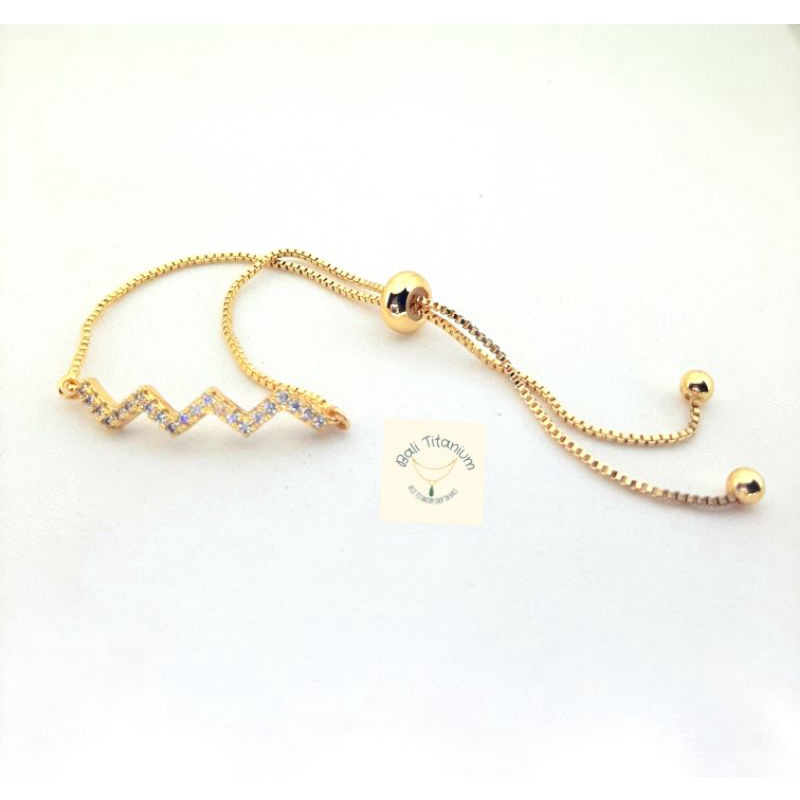 Gelang serut Titanium lapis emas 18K