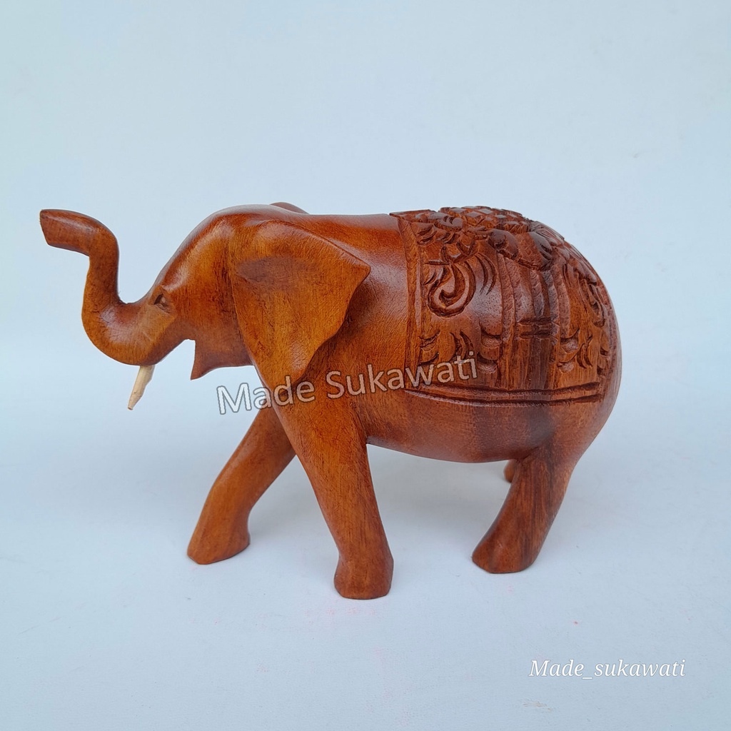 Kerajinan patung kayu gajah berjalan panjang 15cm tinggi 10cm ukiran handmade bali