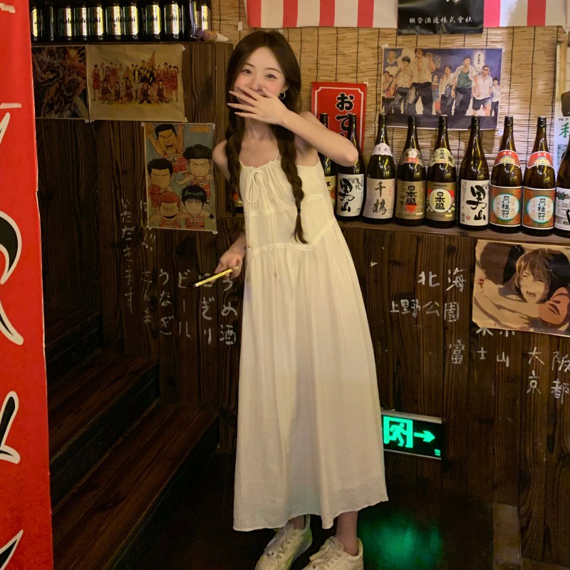 Red Temperamen Kumikumi all-match suspender dress wanita rasa desain musim semi dasi A-line rok mid-length rok