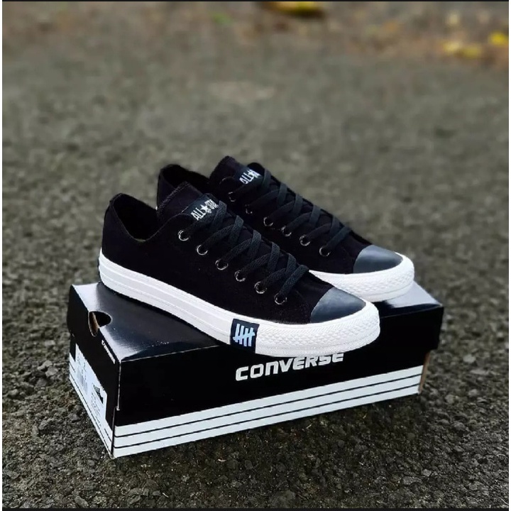 SEPATU SNEAKER CONVERS ALL STAR UNDEFEATED PETIR HITAM BAHAN KANVAS KARET