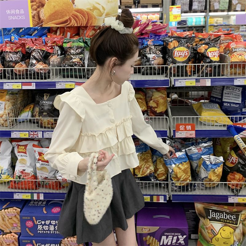 Atasan kerah persegi Prancis musim semi kemeja gaya asing baru