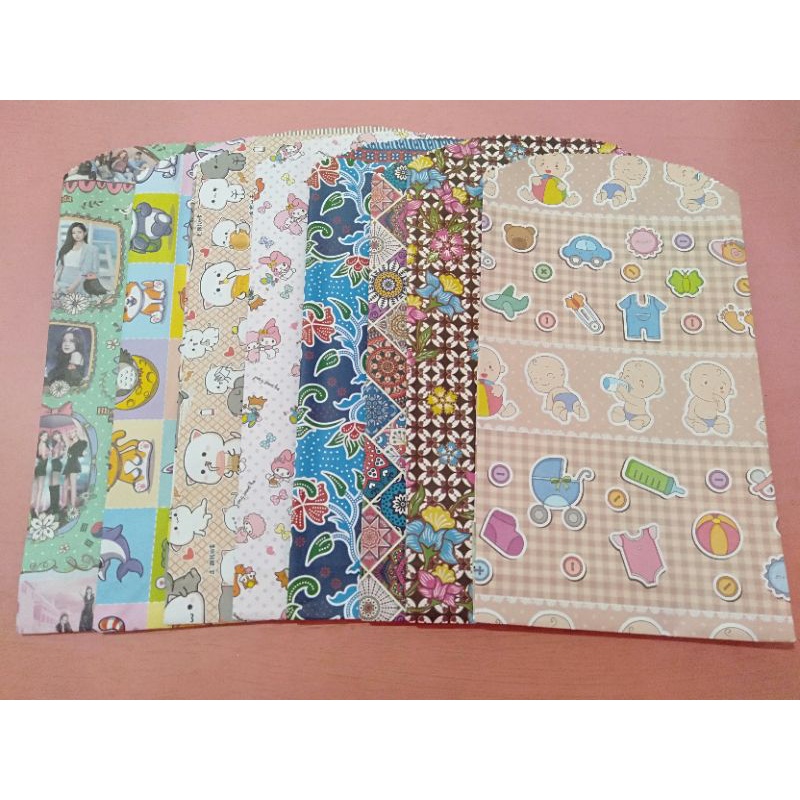 

kertas kado jadi karakter/ kertas kado batik/ kertas kado anak-anak/ kertas kodo lembaran/ kertas kado belum jadi