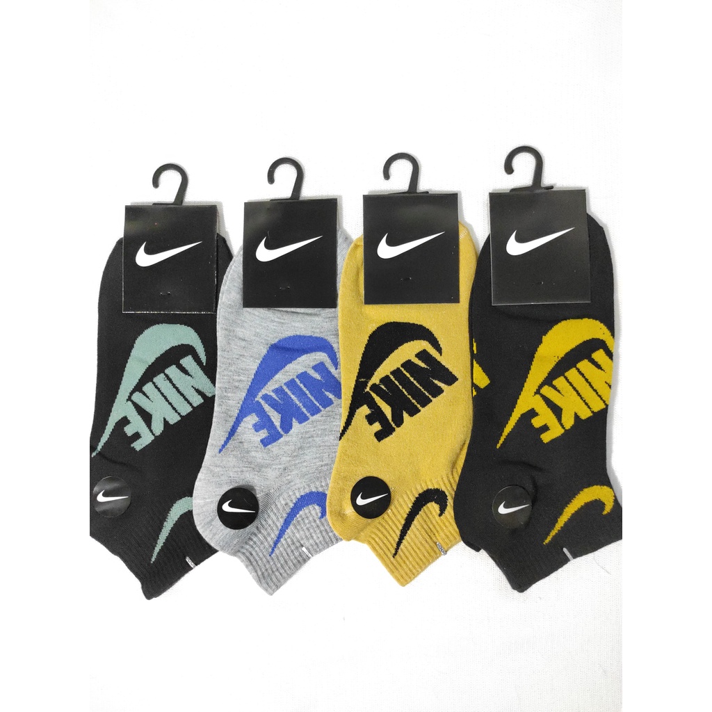 Kaos kaki sport matakaki motif Nike