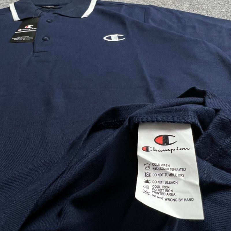 KAOS POLO CHAMPION NAVY BORDIR FULL TAG LABEL CASUAL HYPE