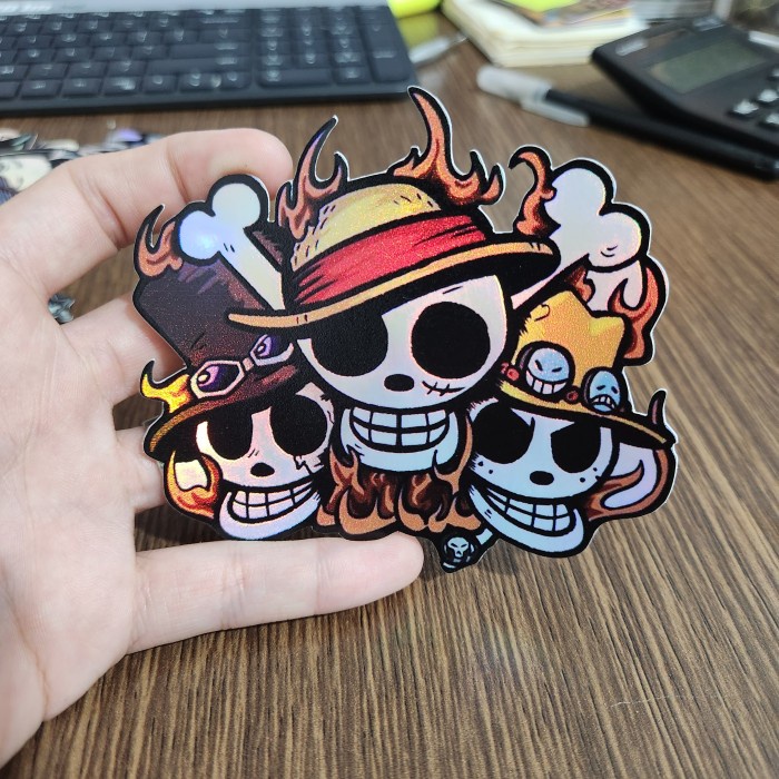 

Sticker Hologram Anime - PSH1732 - One Piece - Logo Ace Sabo Luffy