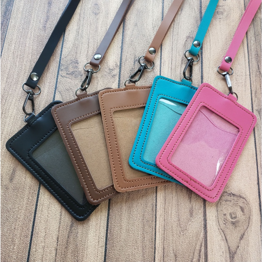 

NAME TAG ID CARD KULIT HOLDER LANYARD MUAT 2 SLOT KARTU TERMURAH BERKUALITAS NTS035
