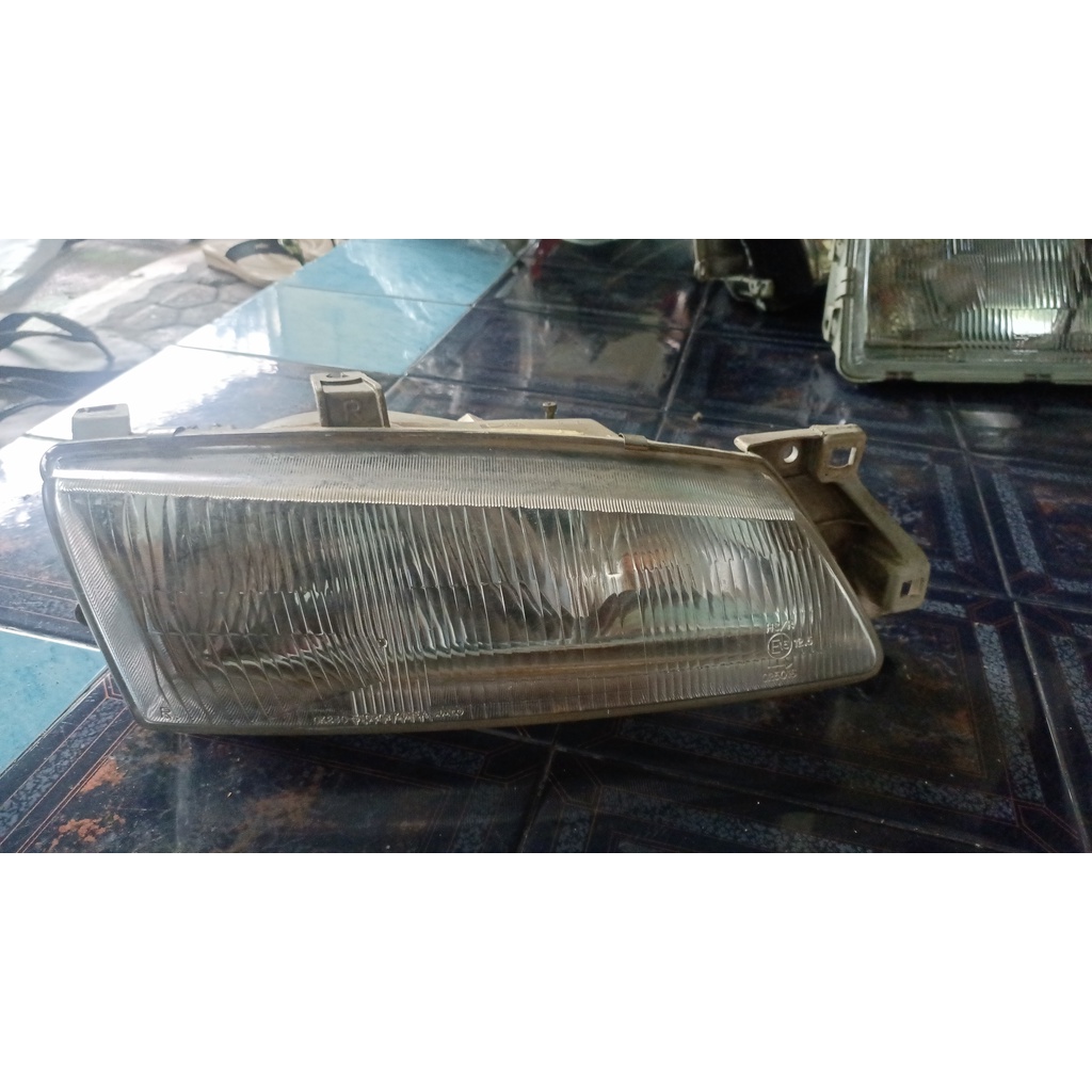 Headlamp kanan timor original