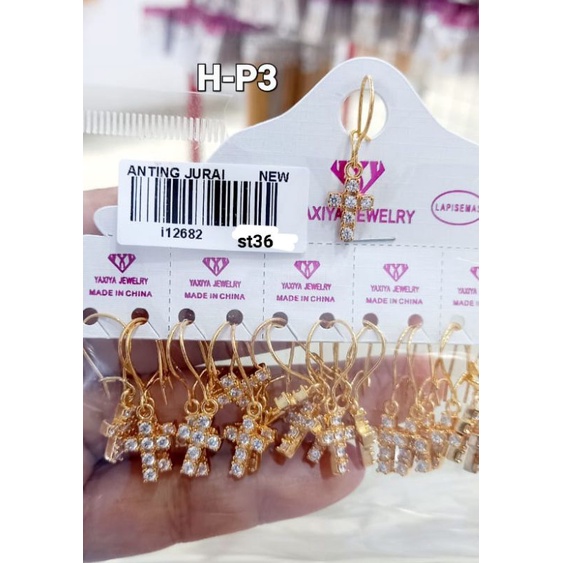 Anting titanium import kode 15 dan anting Salib ,awet,tahan lama