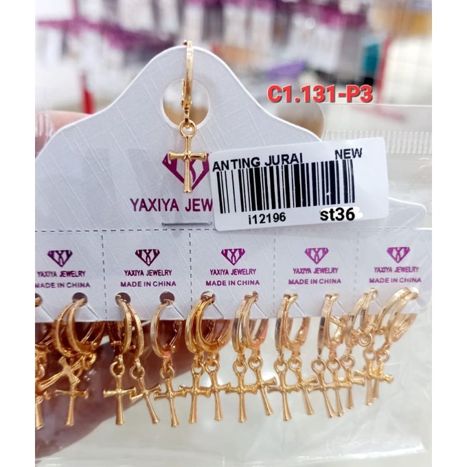 Anting titanium import kode 15 dan anting Salib ,awet,tahan lama