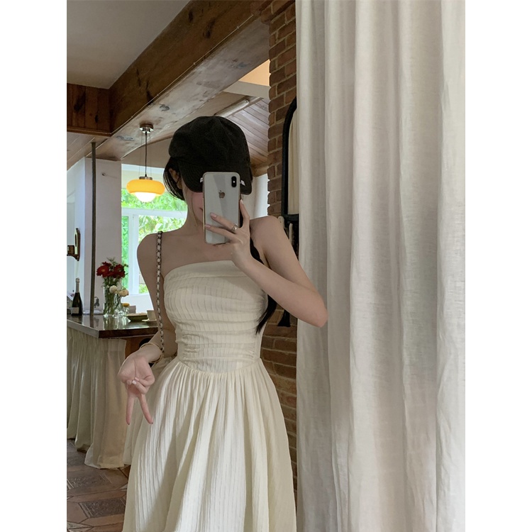 ☃✹gaun pantai musim panas gaya Prancis ceruk putih tanpa lengan tube top dress wanita selera desain musim panas keinginan murni rok panjang rok lutut ramping