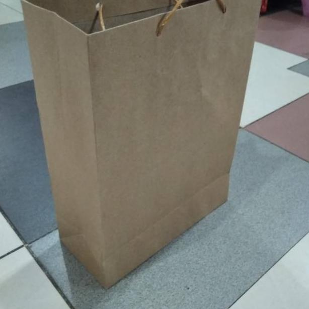 

New Paper bag xl polos tali kertas terlaris dan murah isi 12 pcs