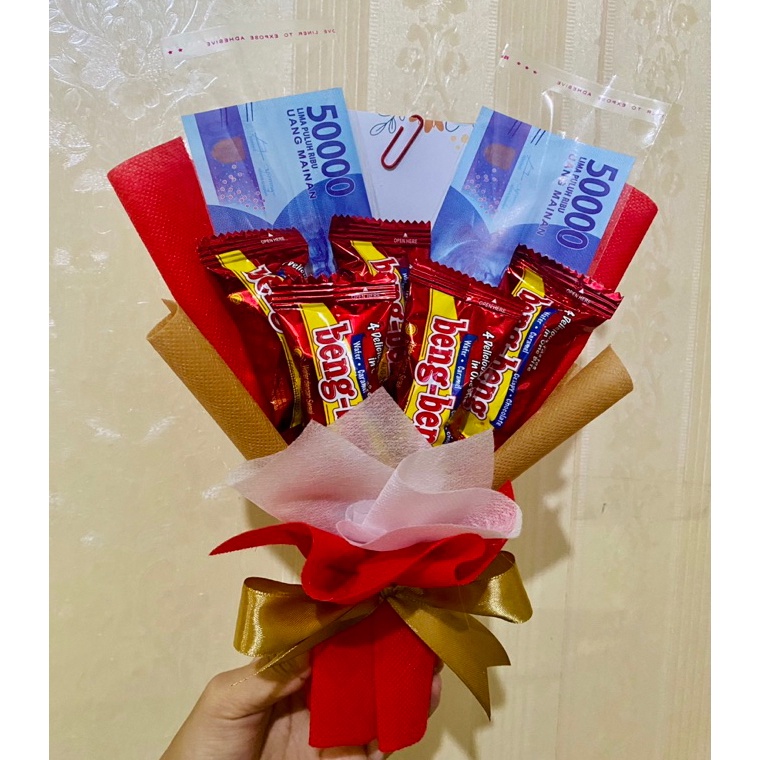 

Import Terlaris Buket bengbeng mini dan 2 slot uang kosong bouquet uang coklat kain spunbond hampers THR