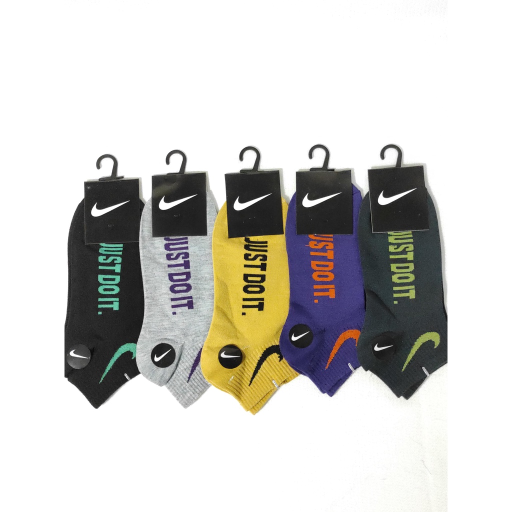 Kaos kaki sport matakaki motif Nike