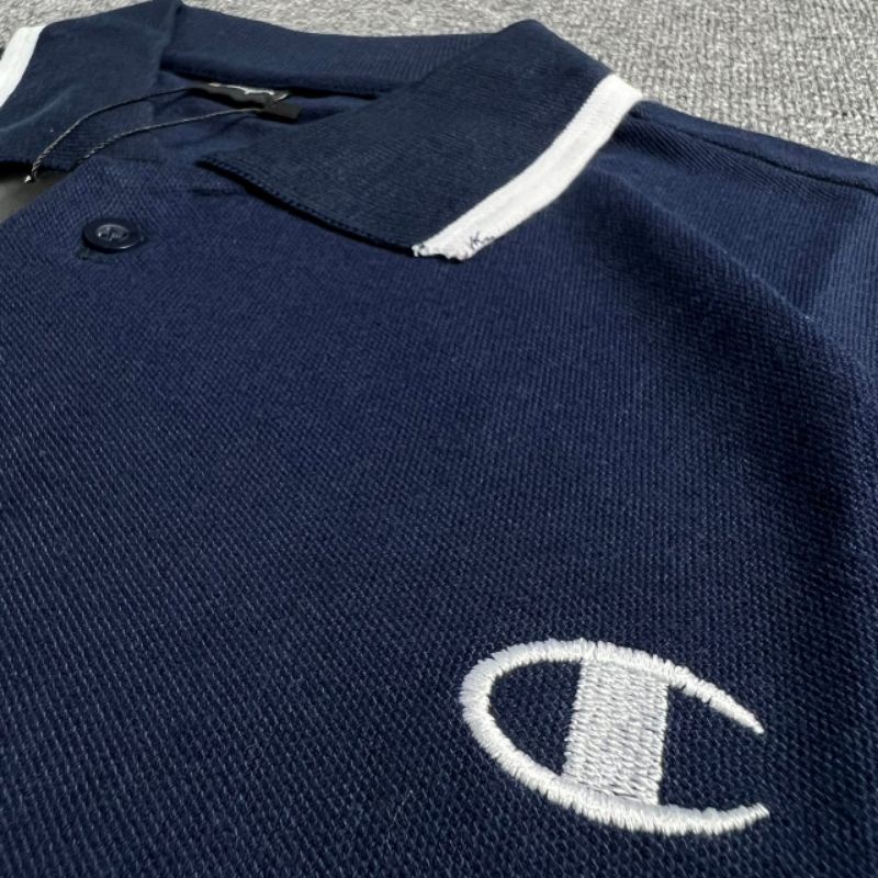 KAOS POLO CHAMPION NAVY BORDIR FULL TAG LABEL CASUAL HYPE