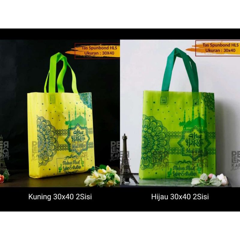 

tas lebaran spunbond 30x40x8 cm gambar 2 sisi