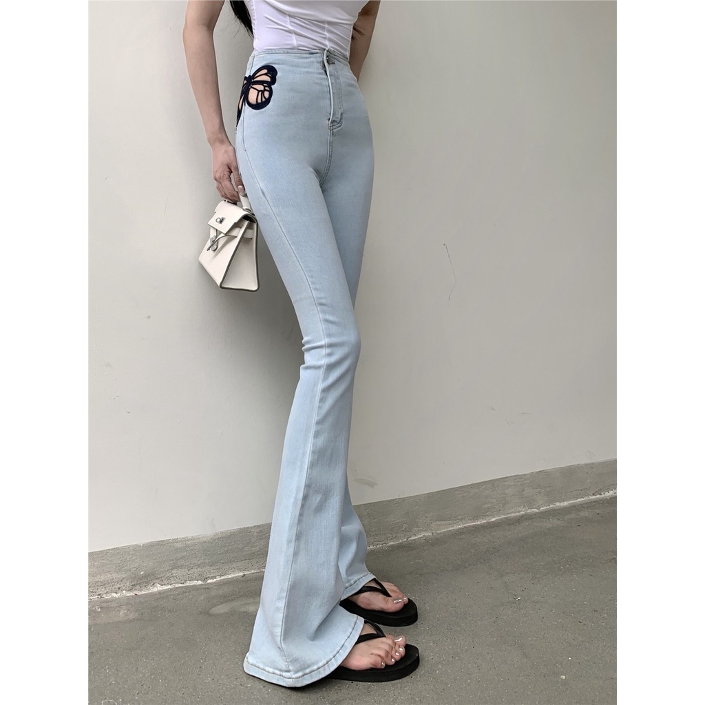 Spice Girl Butterfly Hollow Horseshoe Jeans Pakaian Wanita Musim Panas Kecil Kaki Tinggi Pinggang Kurus Berkobar Celana Mengepel Celana
