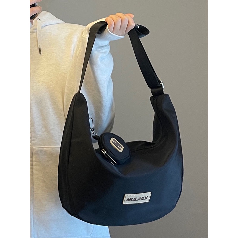 Red Tas Messenger Kapasitas Besar Wanita 2022 Baru Musim Gugur dan Musim Dingin All-Match Kasual Pangsit Tas Kanvas Tas Kelas Komuter tas Bahu