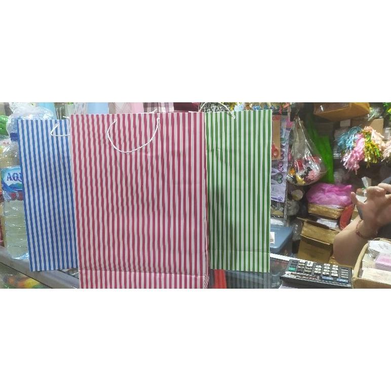 

Promo Paper bag Polio salur garis terlaris dan murah isi 12 pcs