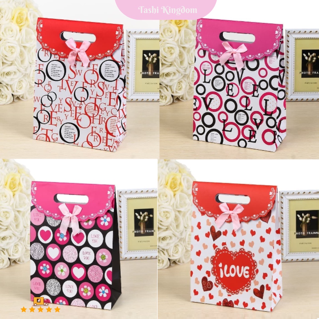 

Paperbag kado birthday , Kantong hadiah valentine love , paperbag motif love , paper bag gift bag baju