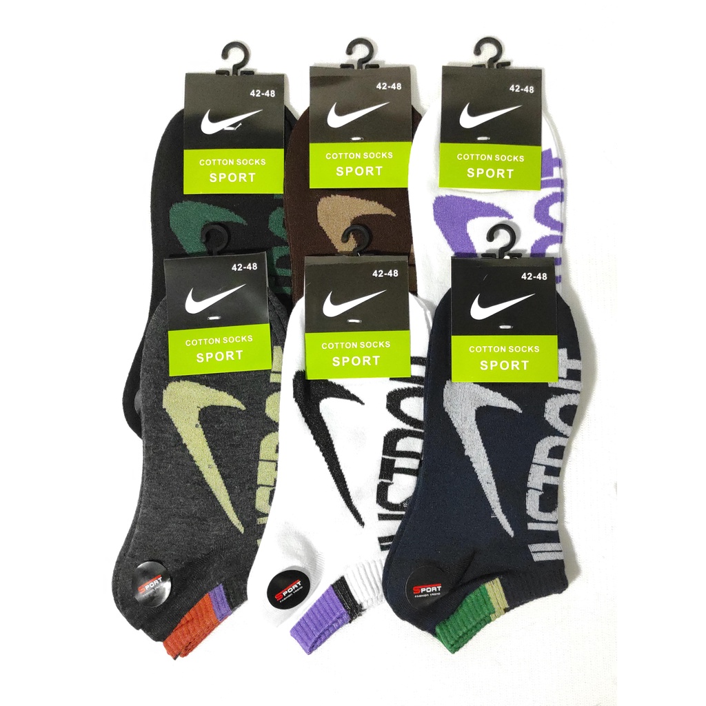 Kaos kaki sport matakaki motif Nike