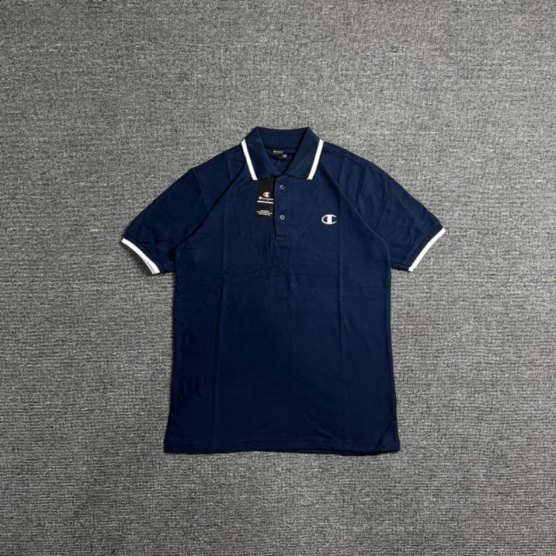 KAOS POLO CHAMPION NAVY BORDIR FULL TAG LABEL CASUAL HYPE