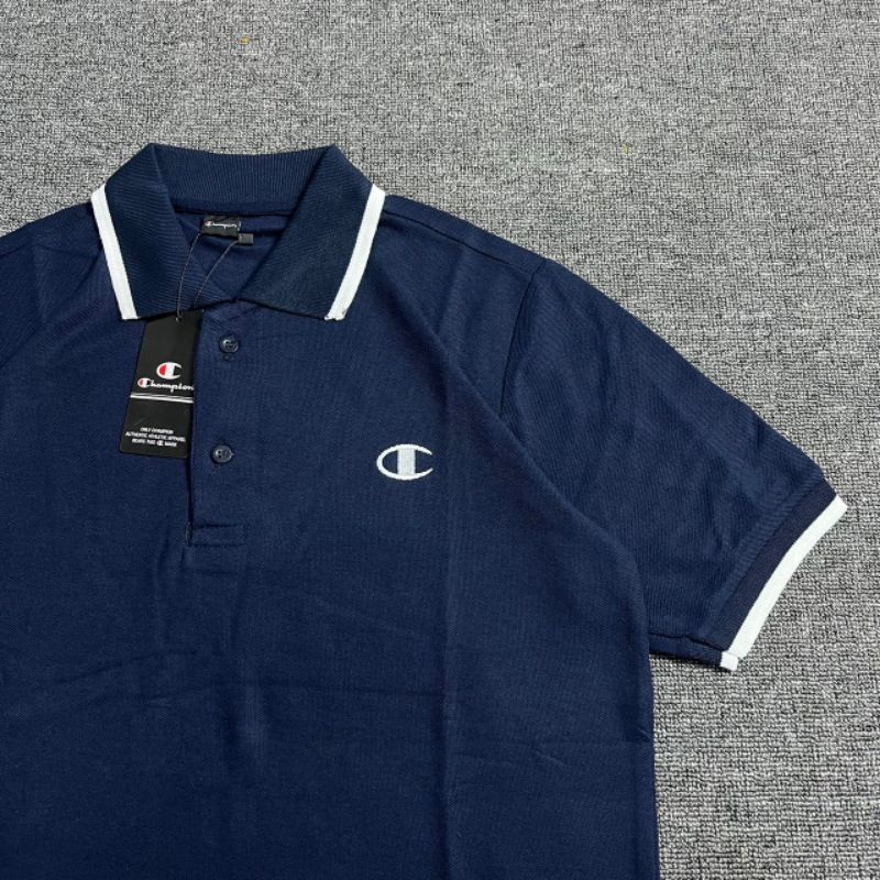 KAOS POLO CHAMPION NAVY BORDIR FULL TAG LABEL CASUAL HYPE