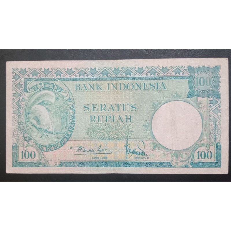 UANGKUNO 100 RUPIAH TUPAI THN 1957