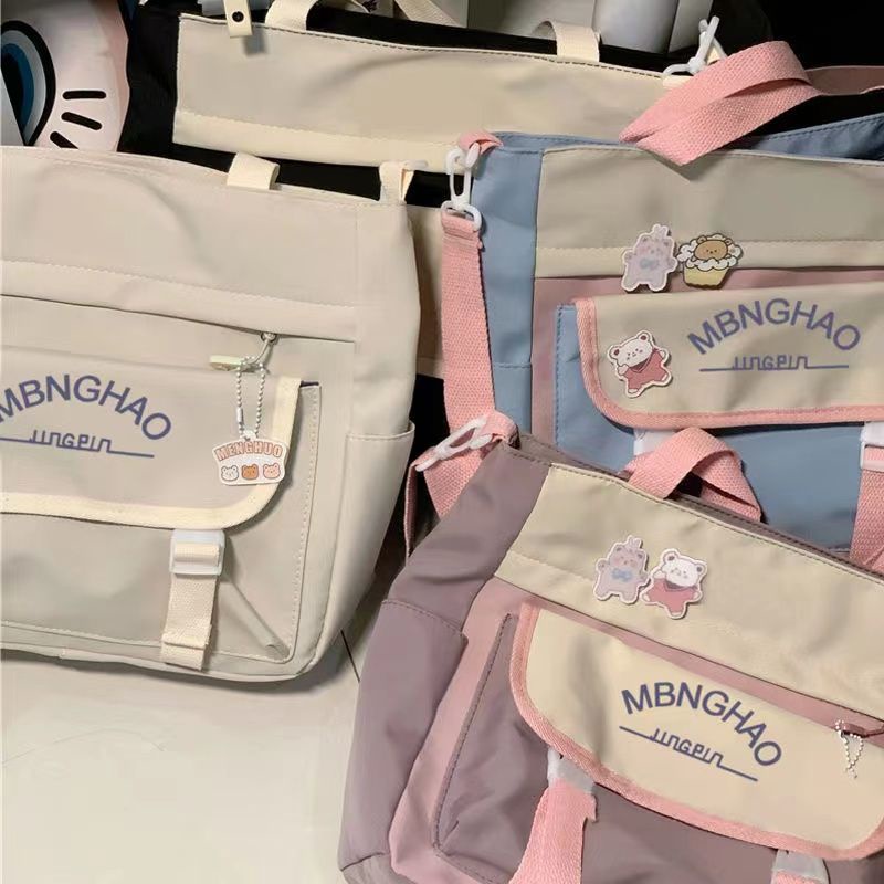 ♣Sera  Toko Gaya Jepang Gaya Kuliah Tas Wanita Berkapasitas Besar Messenger Tas Jepang dan Korea Gadis Mahasiswa Komuter Tas Bahu