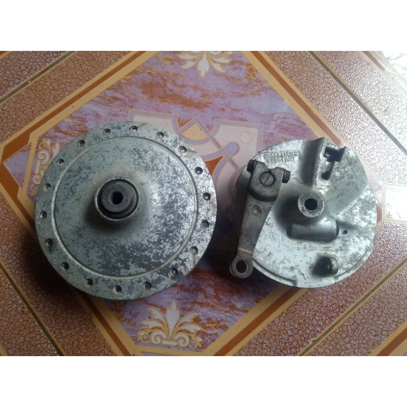 tromol depan suzuki a100