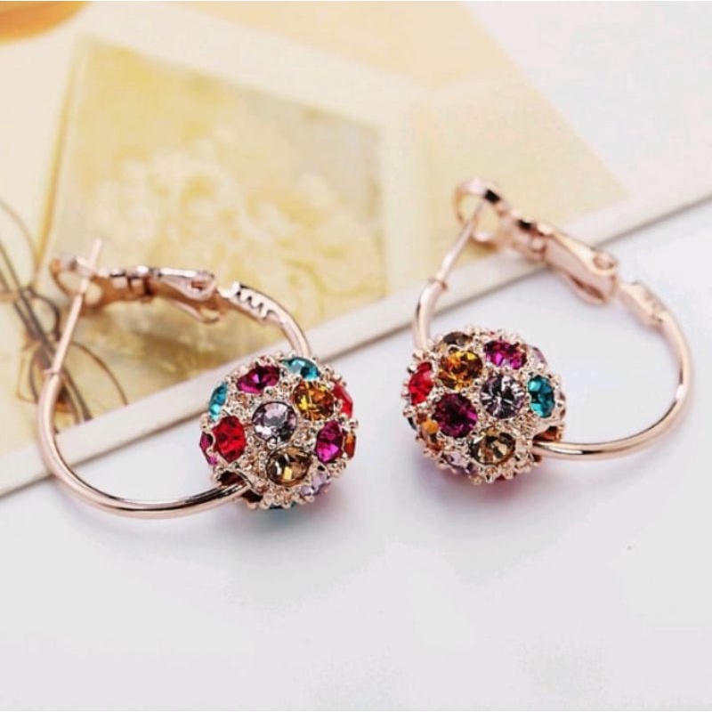 anting bola kristal titanium