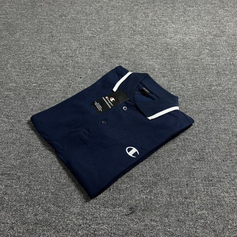 KAOS POLO CHAMPION NAVY BORDIR FULL TAG LABEL CASUAL HYPE