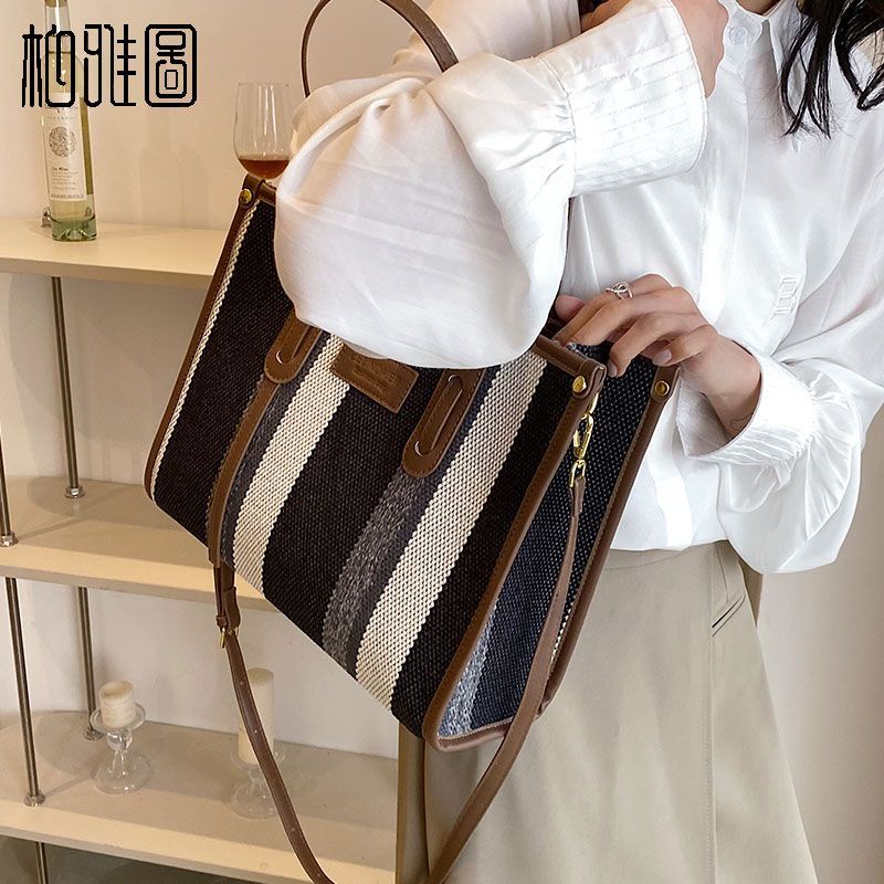 Sera Parker tas Jepang dan Korea Selatan tekstur Messenger tas berkapasitas besar siswa kelas Komuter fashion portable tote bag