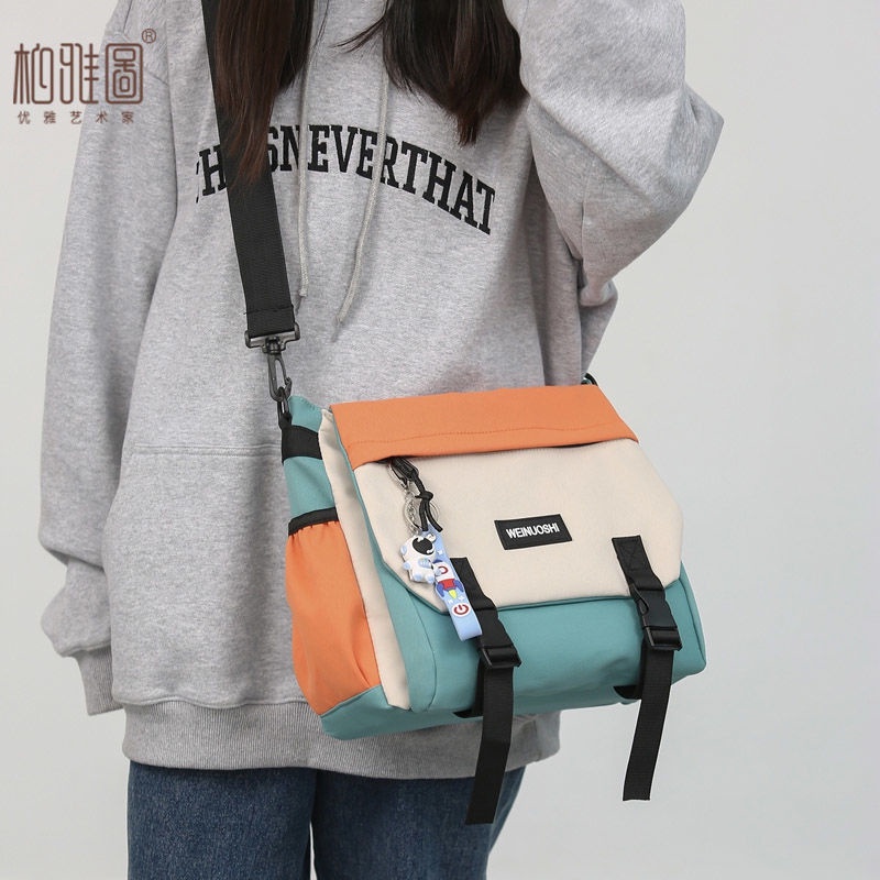 ㍿Sera  Patriot Messenger Bag 2023 Baru Kapasitas Besar Postman Backpack Wanita Jepang Kasual Tas Bahu untuk Kelas