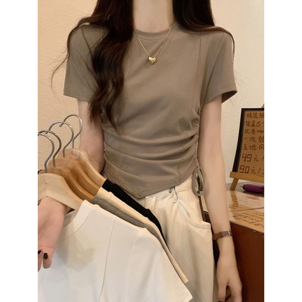 Suhao tidak beraturan gaya Amerika bahu depan t-shirt lengan pendek wanita musim panas gaya manis dan pedas pinggang serut ketat tulang ikan atasan pendek in kaos impor wanita kaos wanita gaya korea lengan pendek kaos pendek perempuan