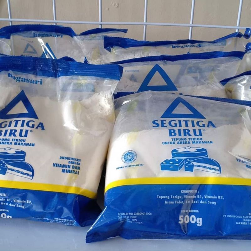 

Tepung Terigu Segitiga Biru 1/5 Kg [ Setengah Kilo Gram ]