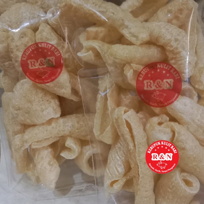 

Kerupuk Kulit Babi R&N (B2) Crunchy Dan Enak. Berat Bersih 100 Gram